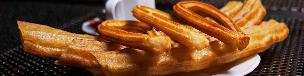 Reparto de churros y porras para cafeterias en Madrid.